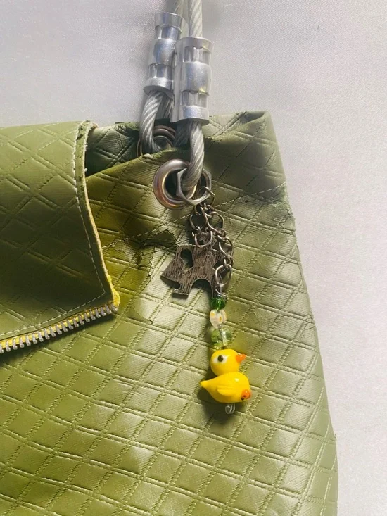 Olive Green Quilted Crossbody Bag with Decorative 'O' Accent - Picture 2 of 7